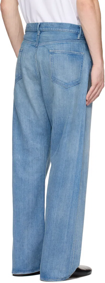 Auralee Light Indigo Jeans With Washed Effect
