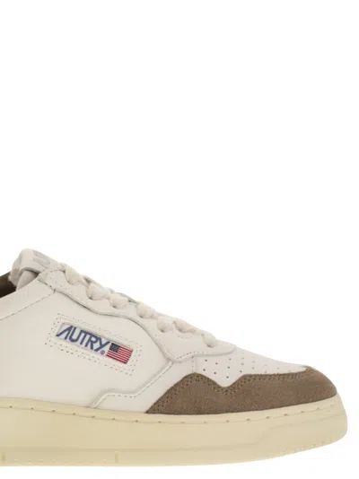 Autry Low Sneaker With Contrast Panels And Perforated Detailing In White