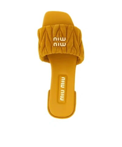 Miu Miu Quilted Flat Sole Open Toe Slippers In Orange