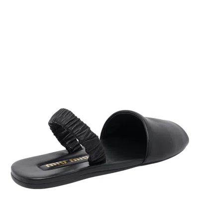 Miu Miu Round Toe Flat Sandals In Black