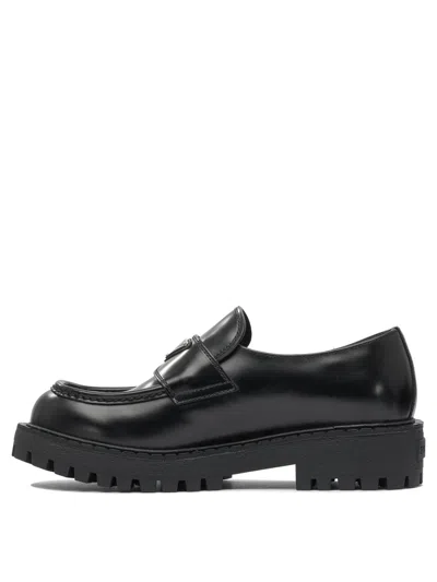Prada Monolith Leather Loafers