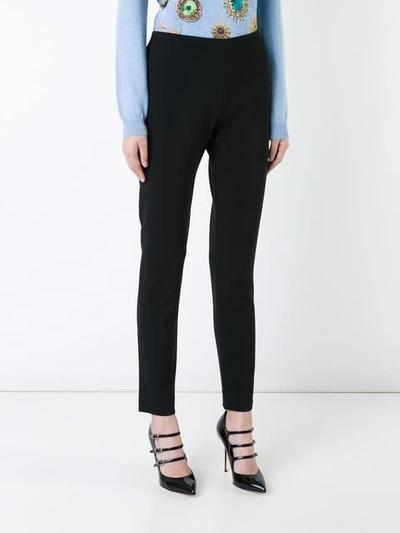 Shop Moschino Slim Fit Trousers In Black