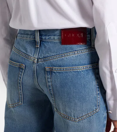 Gucci Blue Jeans With Logo Patch On The Rear And Faded Effect In Denim Woman