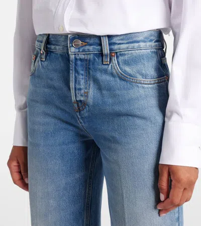 Gucci Blue Jeans With Logo Patch On The Rear And Faded Effect In Denim Woman