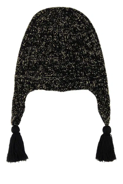 Valentino Wool Blend Beanie With Knit Texture And Tassel Embellishments In Black