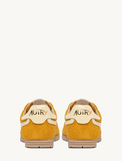 Autry 'windspin Low' Yellow Sneaker With Logo On The Side And On The Heel In Orange