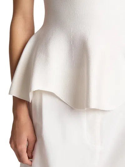 Khaite Andra Mock Neck Peplum Knit Top