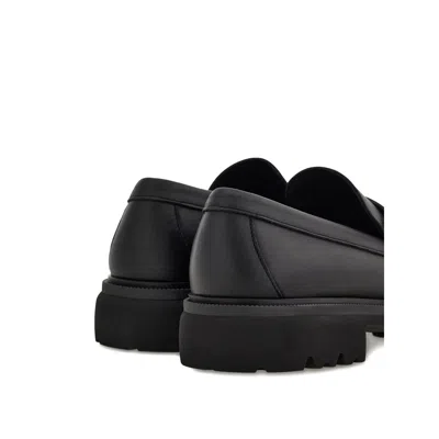 Ferragamo Chunky Sole Loafers With Metal Buckle Detail In Black