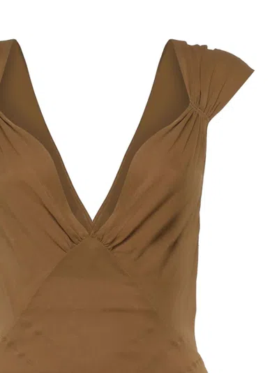 Saint Laurent Semi-sheer Cross-back Bodysuit In Silk Muslin