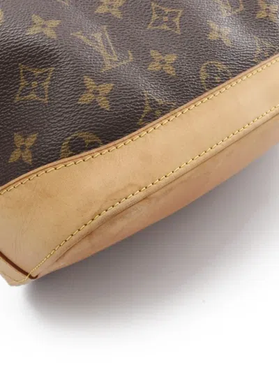 Pre-owned Louis Vuitton 2006 Lockit Vertical Monogram Canvas Handbag In Brown