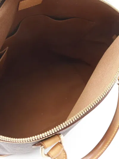 Pre-owned Louis Vuitton 2006 Lockit Vertical Monogram Canvas Handbag In Brown