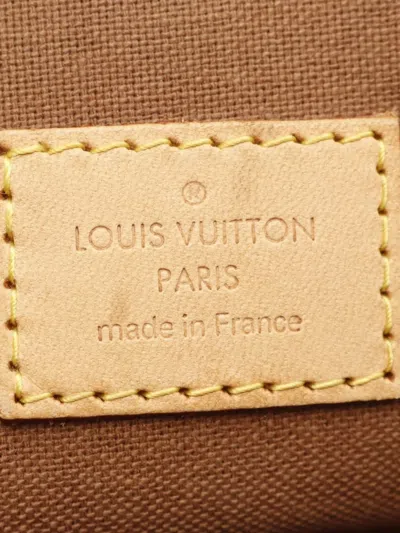 Pre-owned Louis Vuitton 2006 Lockit Vertical Monogram Canvas Handbag In Brown