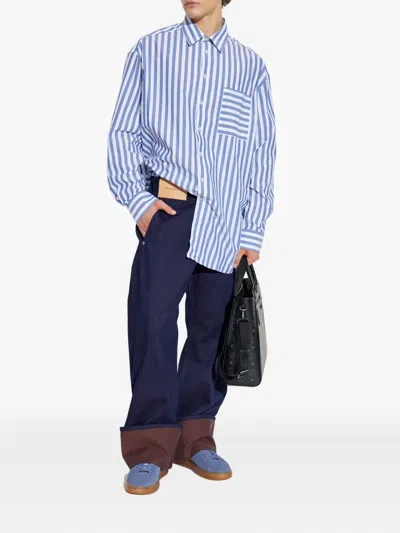 Jw Anderson Blue Jeans With Logo Patch Applied On The Front