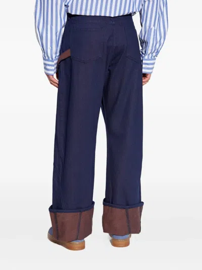 Jw Anderson Blue Jeans With Logo Patch Applied On The Front