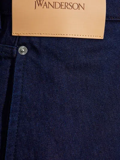 Jw Anderson Blue Jeans With Logo Patch Applied On The Front