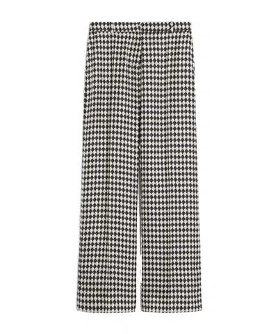 Max Mara Flared Printed Silk Trousers In Black