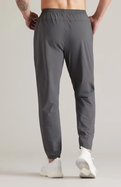 Rhone Pursuit Training Pants In Brown