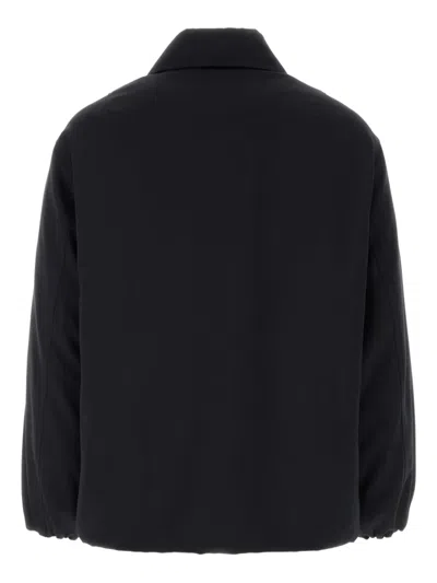 Jil Sander Wool Coat With Long Sleeves And Curved Hem In Black