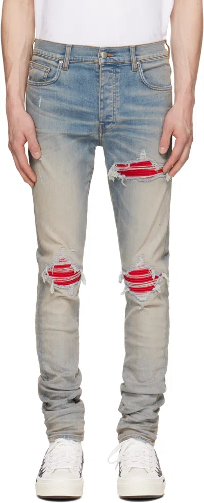 Amiri Mx1 Slim Fit Jeans With Distressed Red Accents In Blue