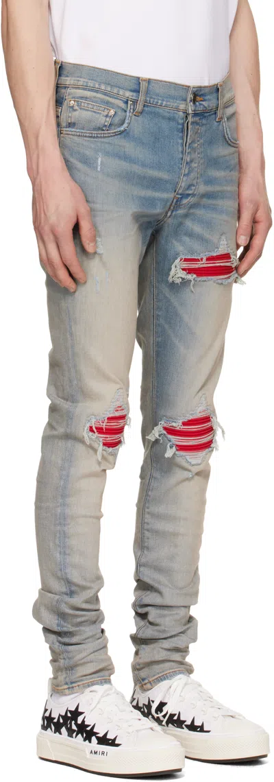 Amiri Mx1 Slim Fit Jeans With Distressed Red Accents In Blue