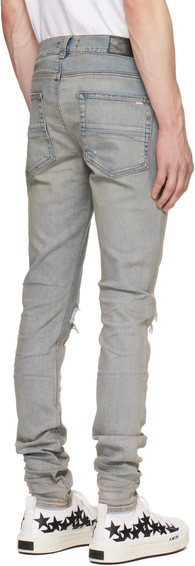 Amiri Mx1 Slim Fit Jeans With Distressed Red Accents In Blue