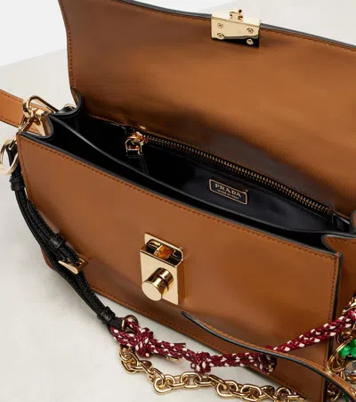 Prada Soft Sound Large Caramel Leather Bag With Charms In Brown