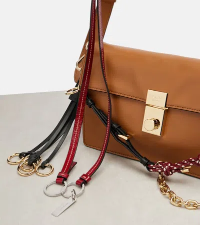 Prada Soft Sound Large Caramel Leather Bag With Charms In Brown