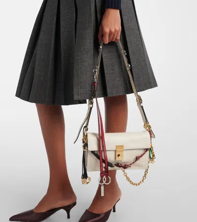 Prada Soft Sound Small Leather Shoulder Bag With Charms In White