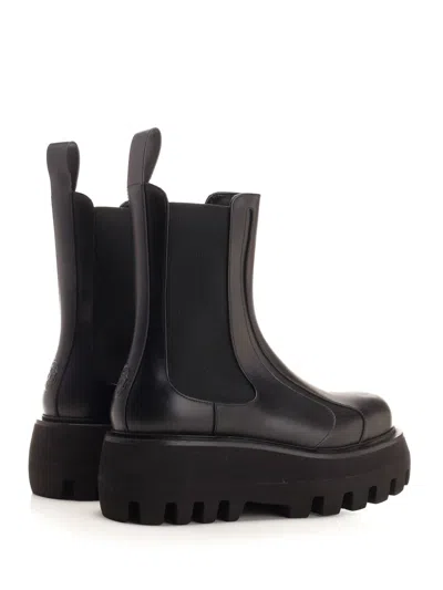 Alexander Mcqueen Black Glossy Leather Ankle Boots With Tank Sole
