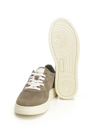 Autry Low-top Suede Sneakers With Rubber Sole And Lace-up Closure In Green