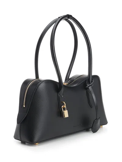 Stella Mccartney Stella Ryder Logo-embossed Embellished Textured Vegan Leather Tote In Black