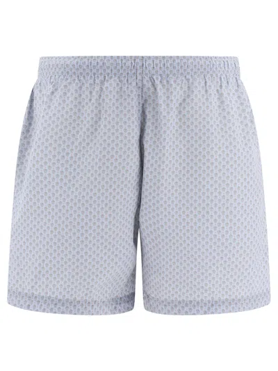 Alexander Mcqueen Embroidered Skull Swim Shorts In Blue