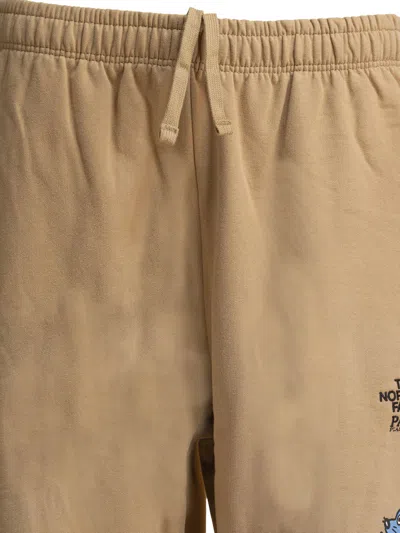 The North Face Graphic Print Elastic Waistband Trousers In Gray