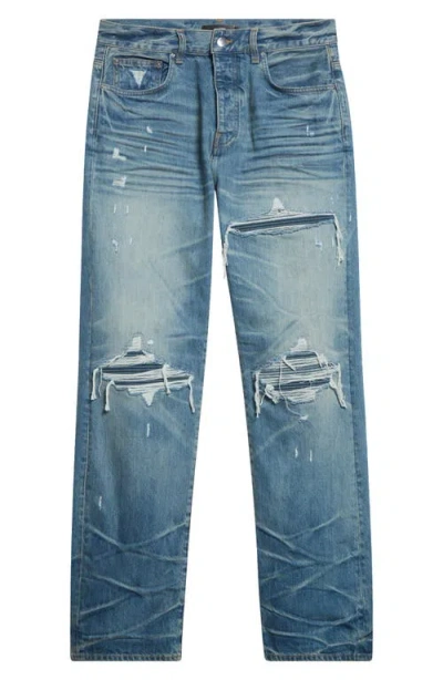 Amiri Men Blue Jeans With Ripped Details On The Front And Logo Patch On The Rear In Denim Man In Blue