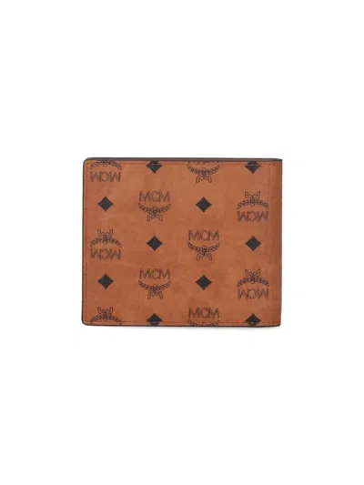 Mcm Printed Canvas Wallet In Brown