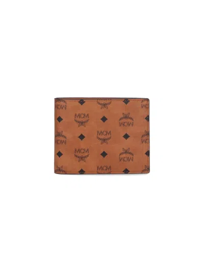 Mcm Printed Canvas Wallet In Brown