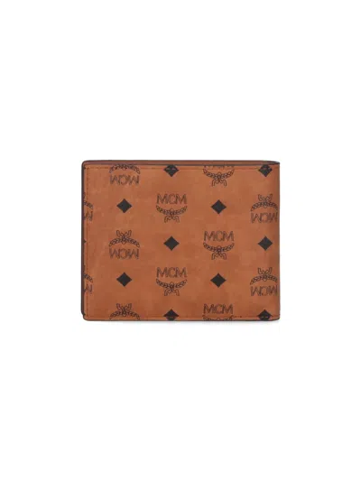 Mcm Printed Canvas Wallet In Brown