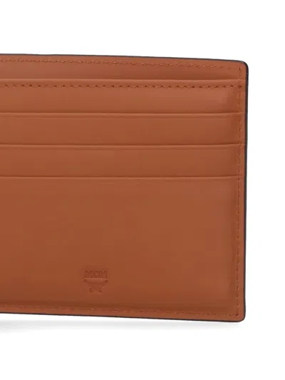 Mcm Printed Canvas Wallet In Brown