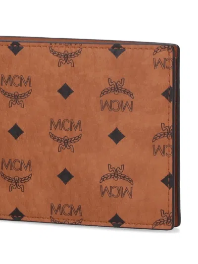 Mcm Printed Canvas Wallet In Brown