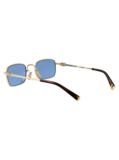 Miu Miu Rectangular Sunglasses In Gold
