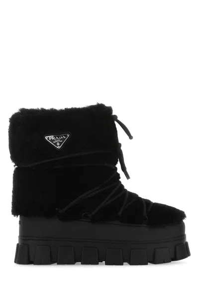 Prada Shearling And Rubber Ankle Boots With Fur Texture In Black