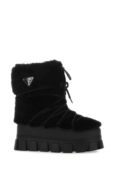 Prada Shearling And Rubber Ankle Boots With Fur Texture In Black