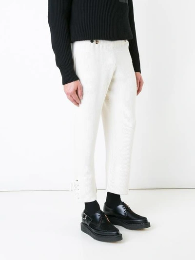 Shop Jw Anderson Ribbed Cropped Trousers - White