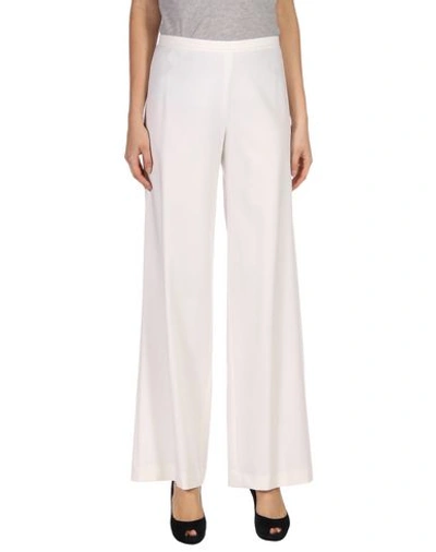 Shop The Row Casual Pants In Ivory
