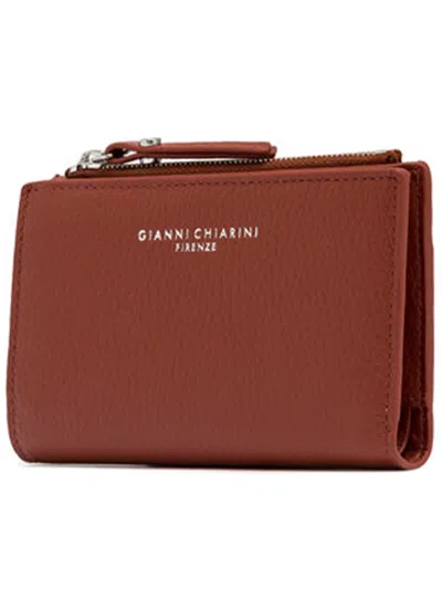 Gianni Chiarini (b) The Name And Address Of The Manufacturer;