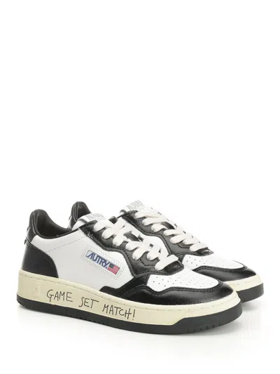 Autry Medalist Low Sneakers Gold In Black