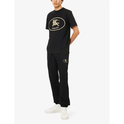 Burberry Knight Stamp Cotton Track Pants In Black