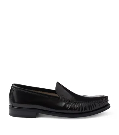 Prada Patent Leather Logo Loafers In Black