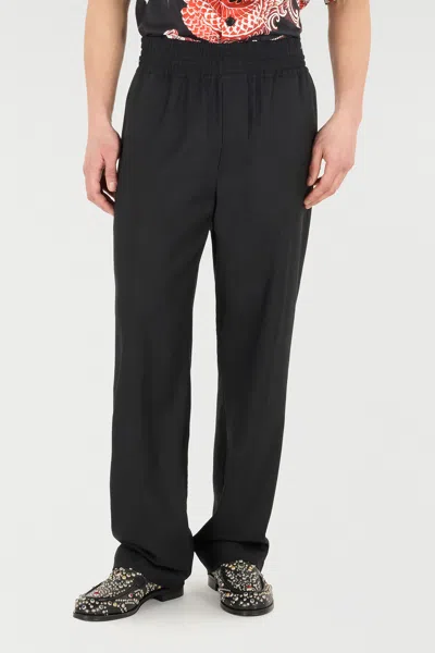 Roberto Cavalli Elasticated-waist Virgin-wool Trousers In Black