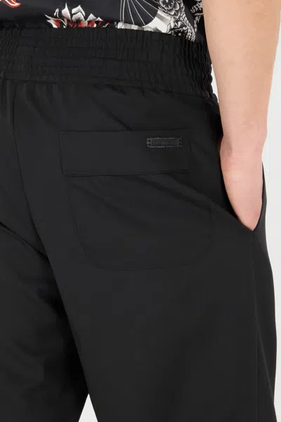 Roberto Cavalli Elasticated-waist Virgin-wool Trousers In Black